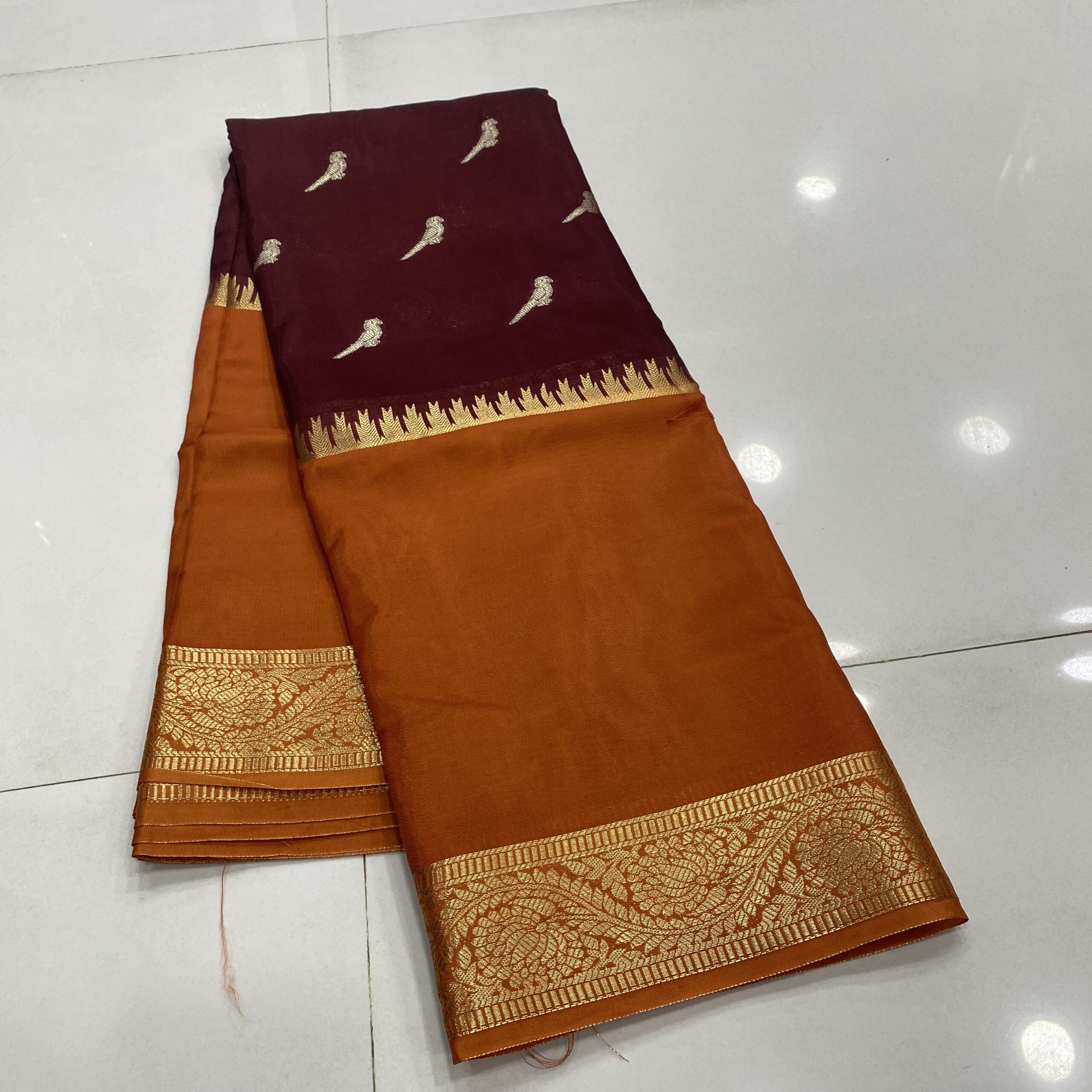 Banarasi Semi Silk Saree in Orange with Maroon featuring 3D Bird Weaves Folded Body