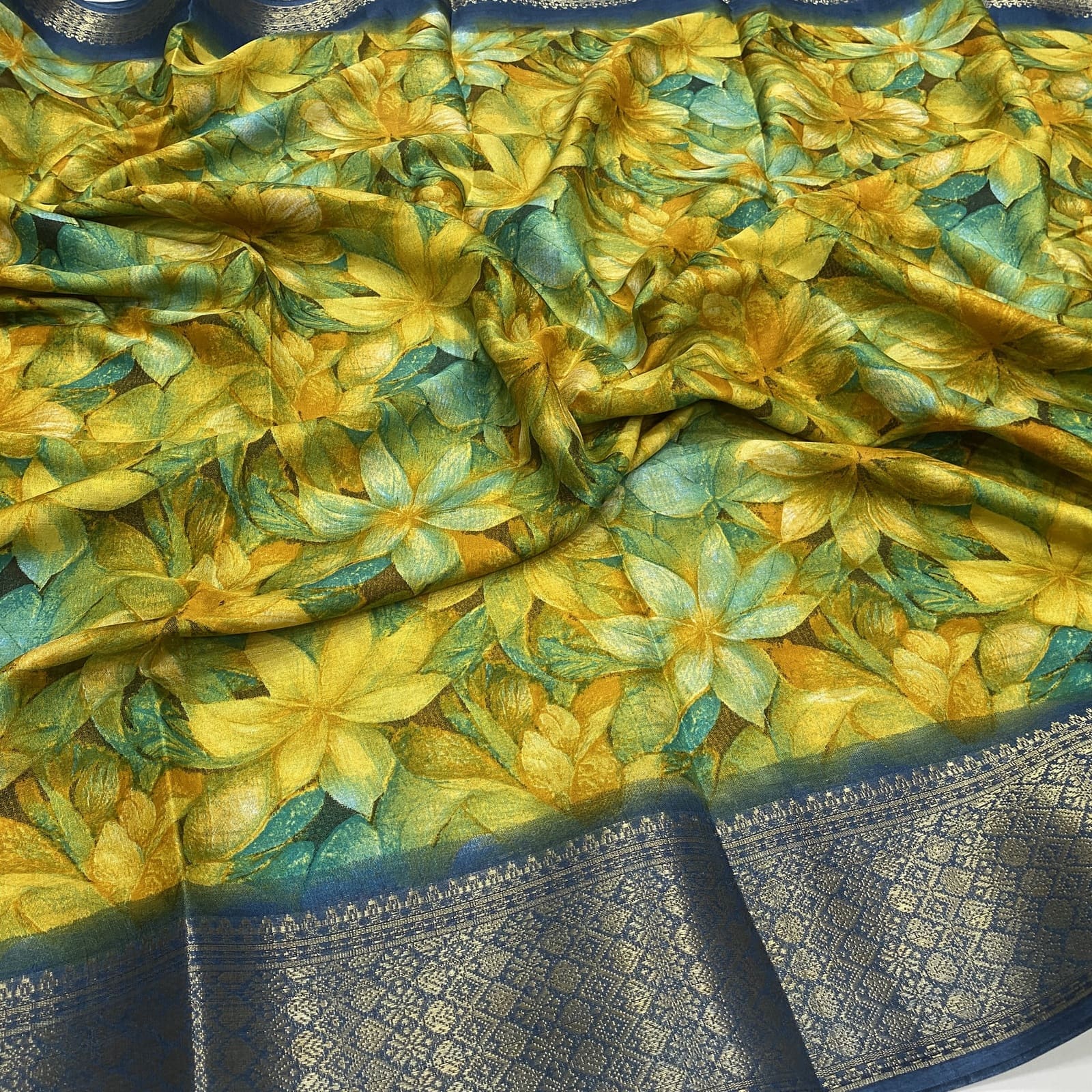 Dola Silk Saree in Blue with Floral Print and Kanchi Border