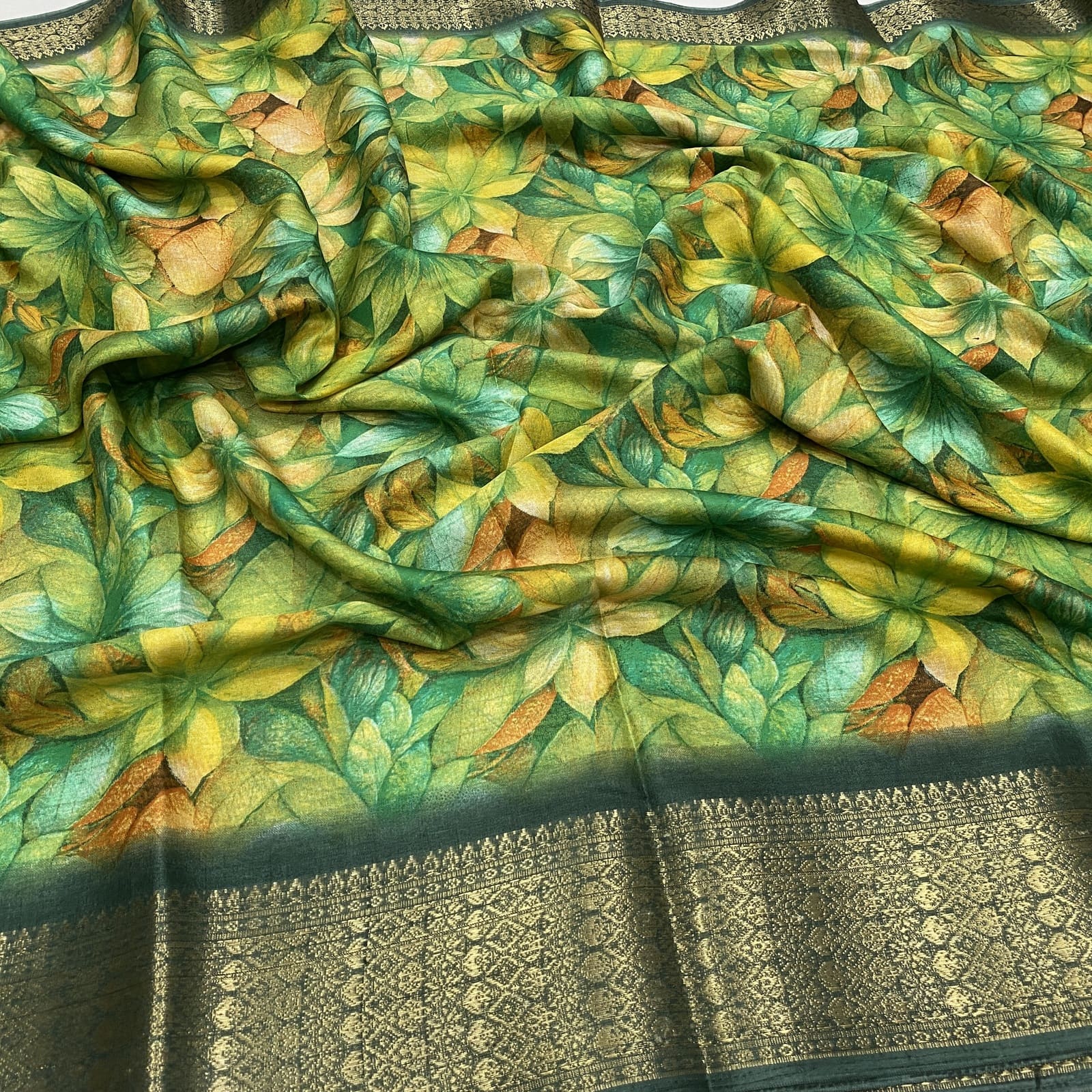 Dola Silk Saree in Bottle Green with Floral Print and Kanchi Border