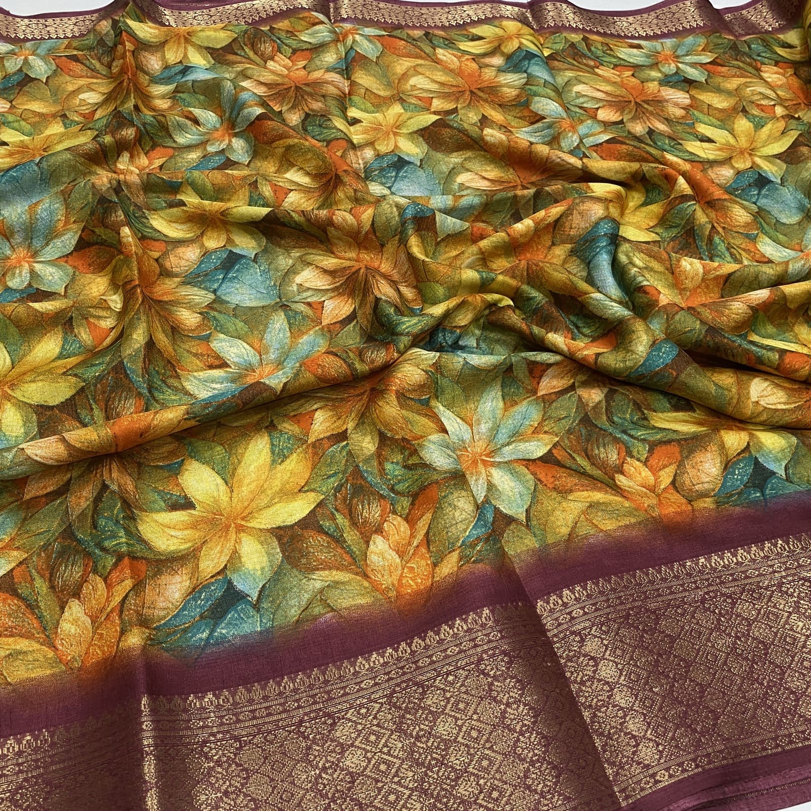 Dola Silk Saree in Maroon with Floral Print and Kanchi Border