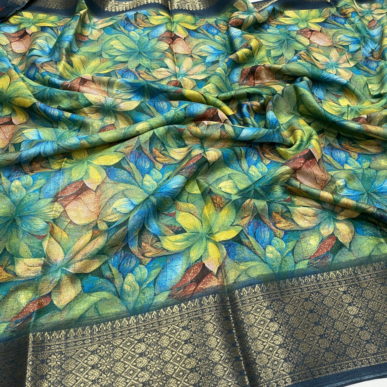 Dola Silk Saree in Rama Blue with Floral Print and Kanchi Border