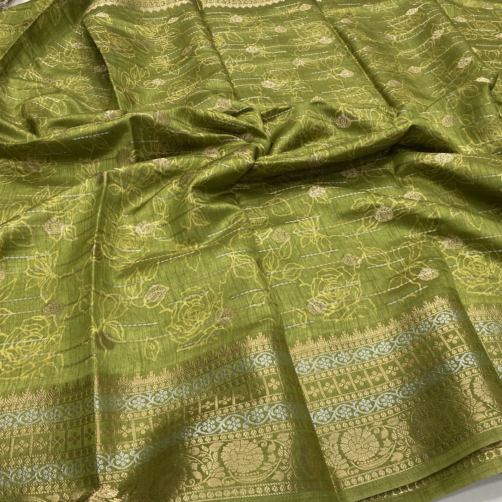 ola Tussar Semi Saree in Green with Floral Emboss Design
