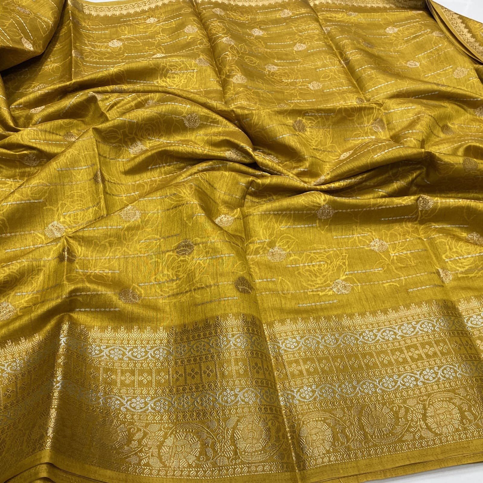 Dola Tussar Semi Saree in Mustard with Floral Emboss Design