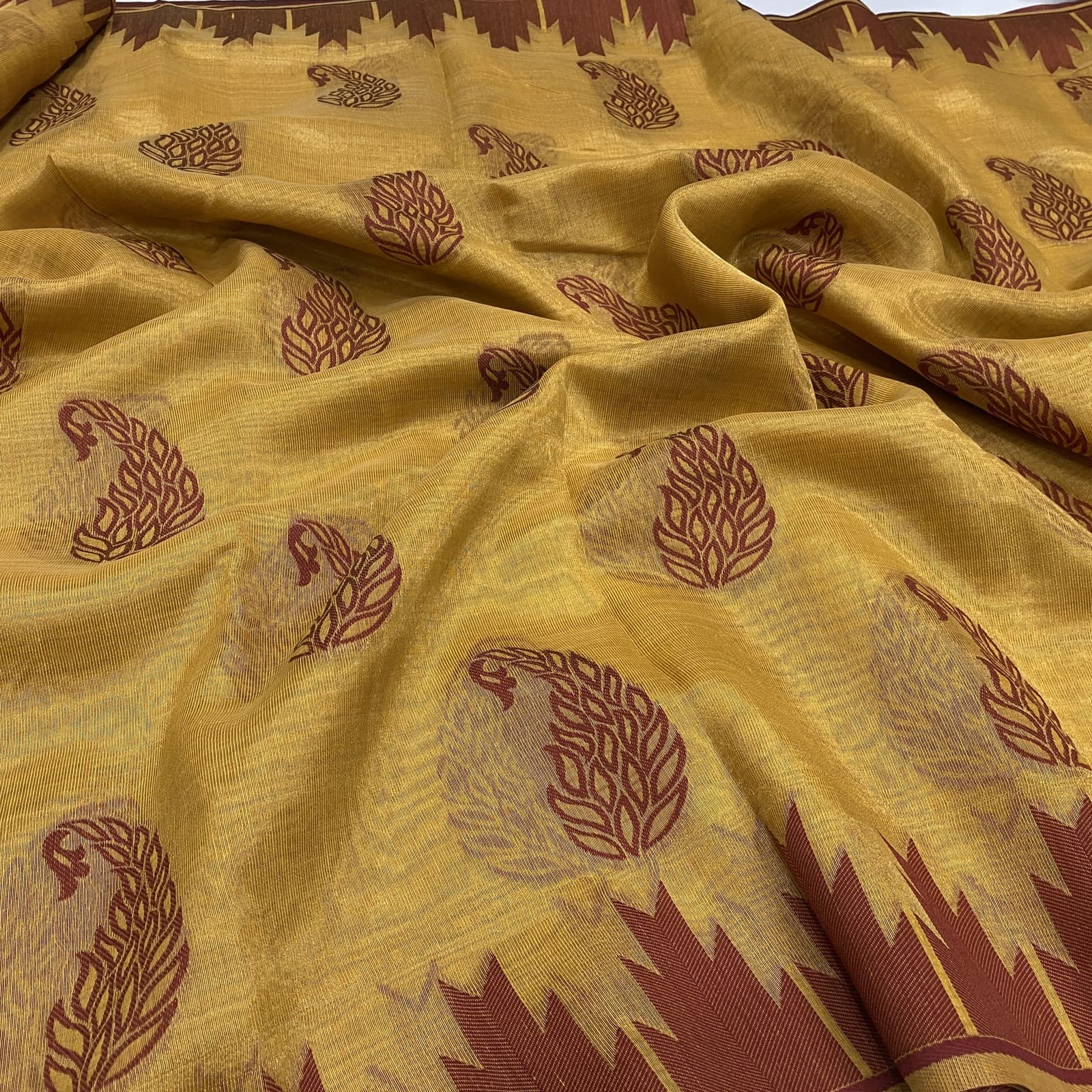 Kota Tissue Saree in Mustard with Mango Weaves and Temple Border