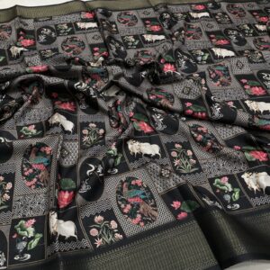 Black raw dola silk pichwai print saree with peacock, flower and cow design