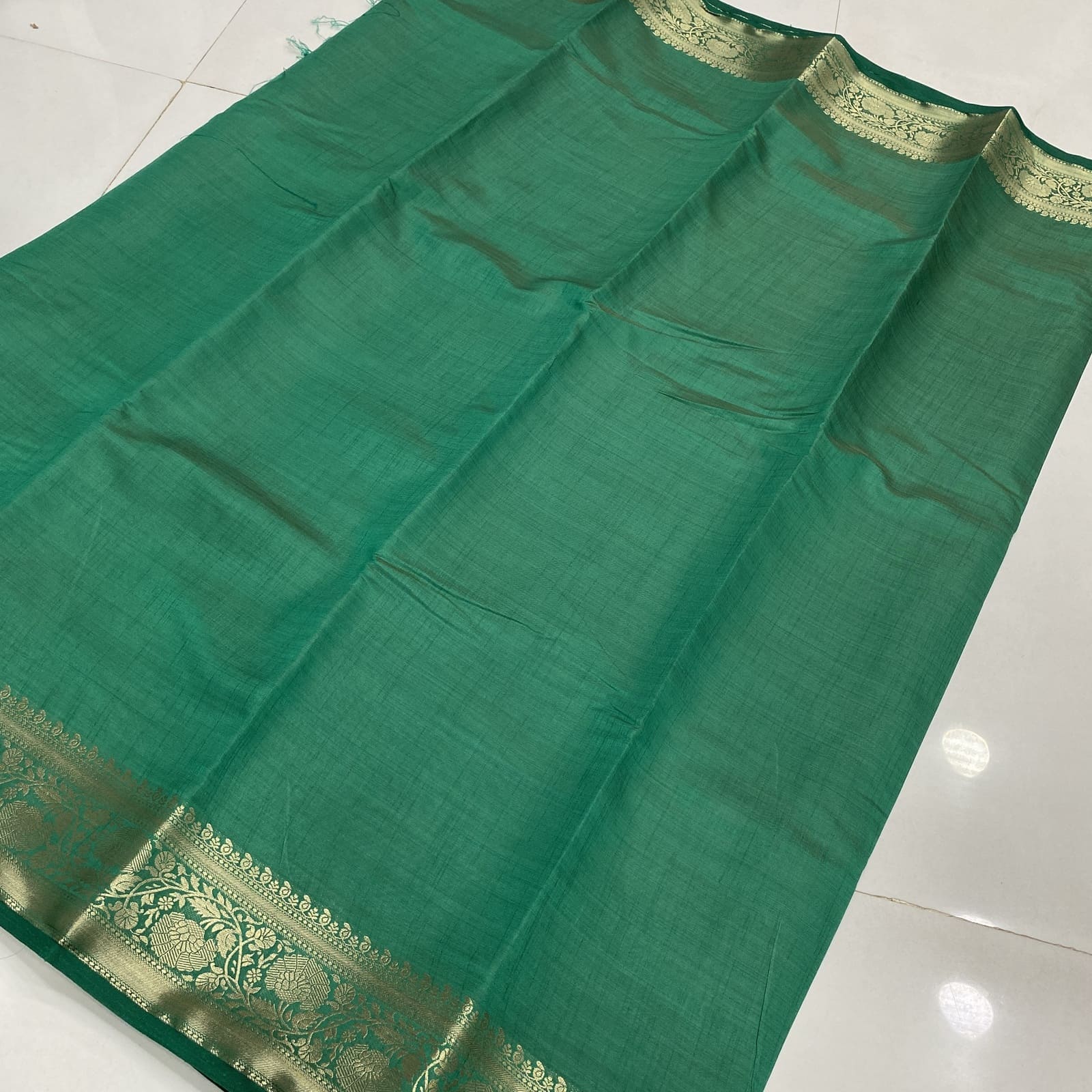 Raw Silk Saree in Rama Green with Floral Zari Border