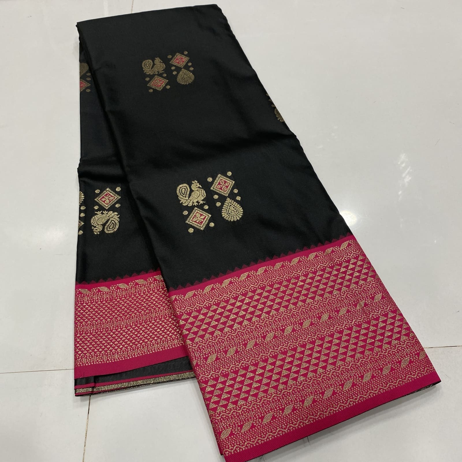 Semi Silk Saree in Black with Pink featuring Annam Rangoli Deepam Butta Design