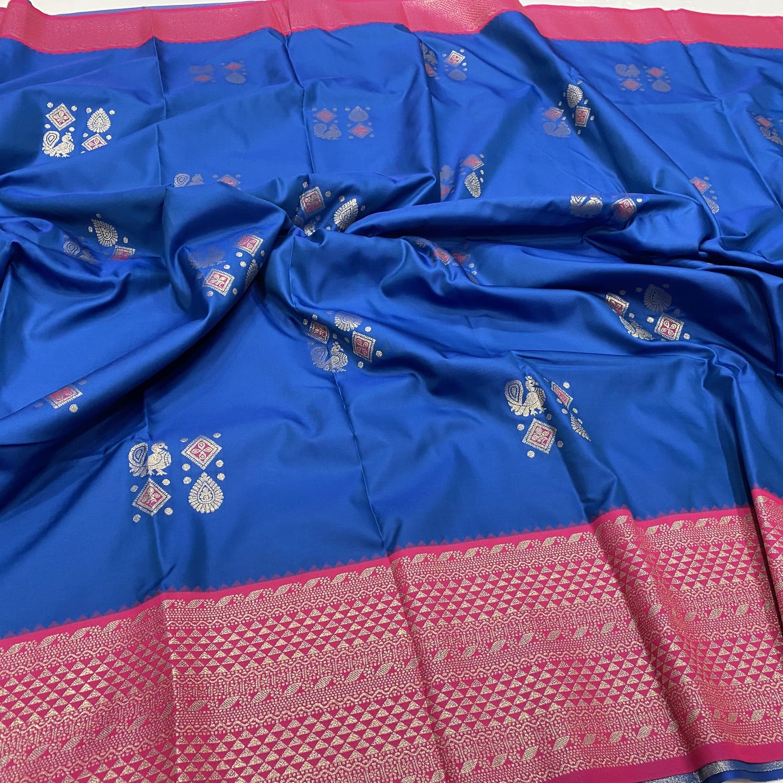 Semi Silk Saree in Blue with Pink featuring Annam Rangoli Deepam Butta Design