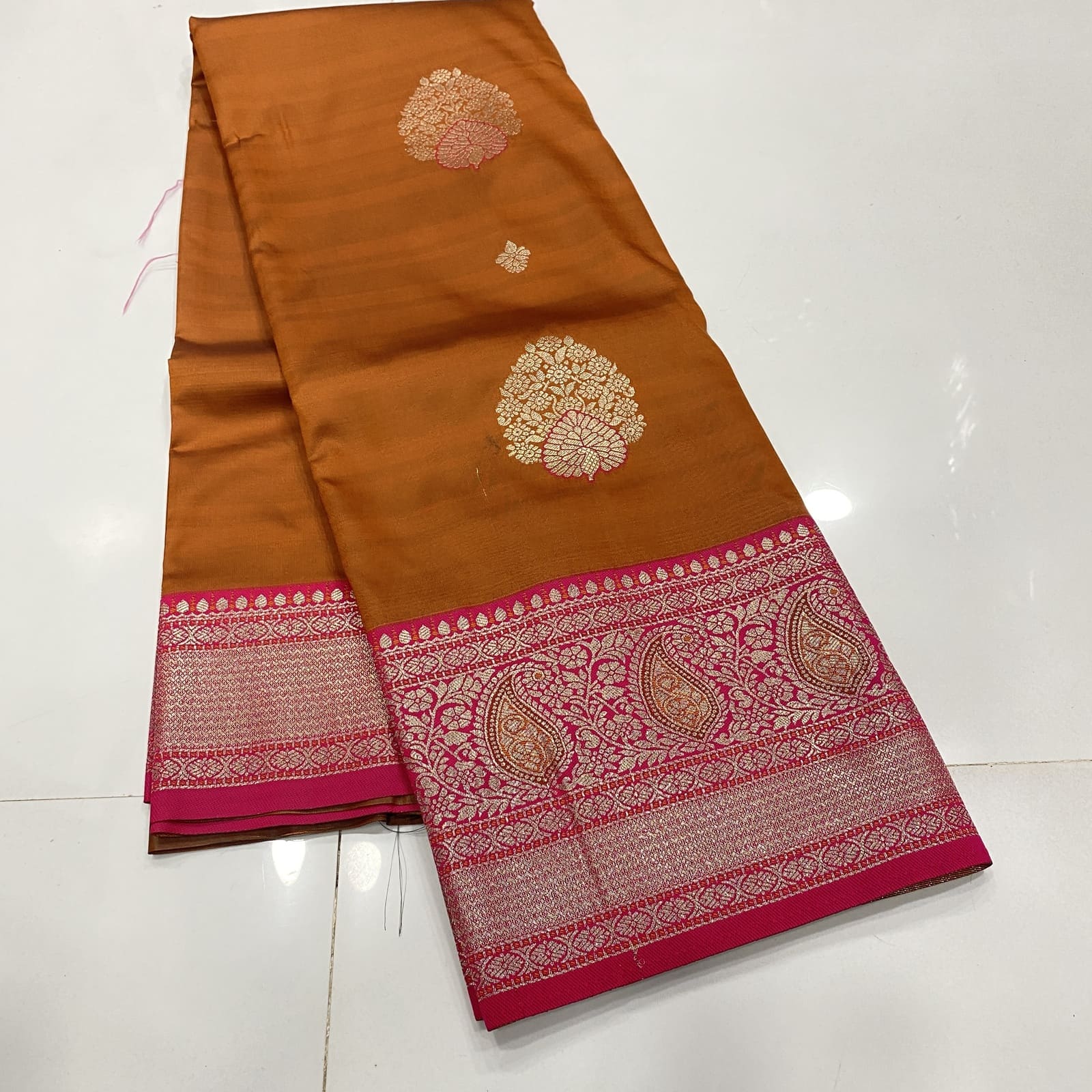 Semi Silk Saree in Mustard with Pink Border featuring Butta Design