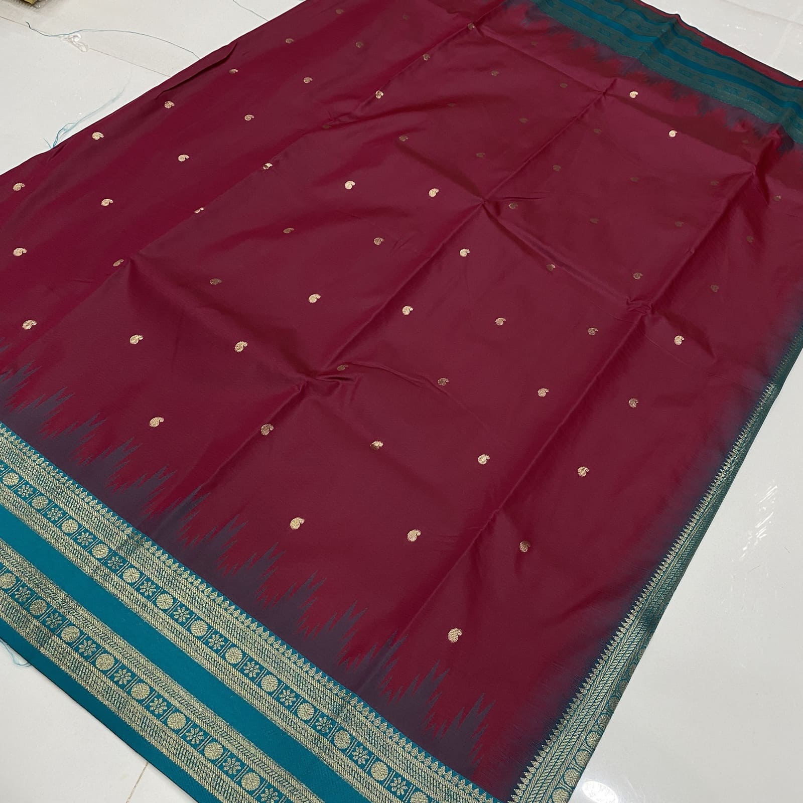 Semi Silk Saree in Strawberry with Blue featuring Mango Leaf Zari Butta