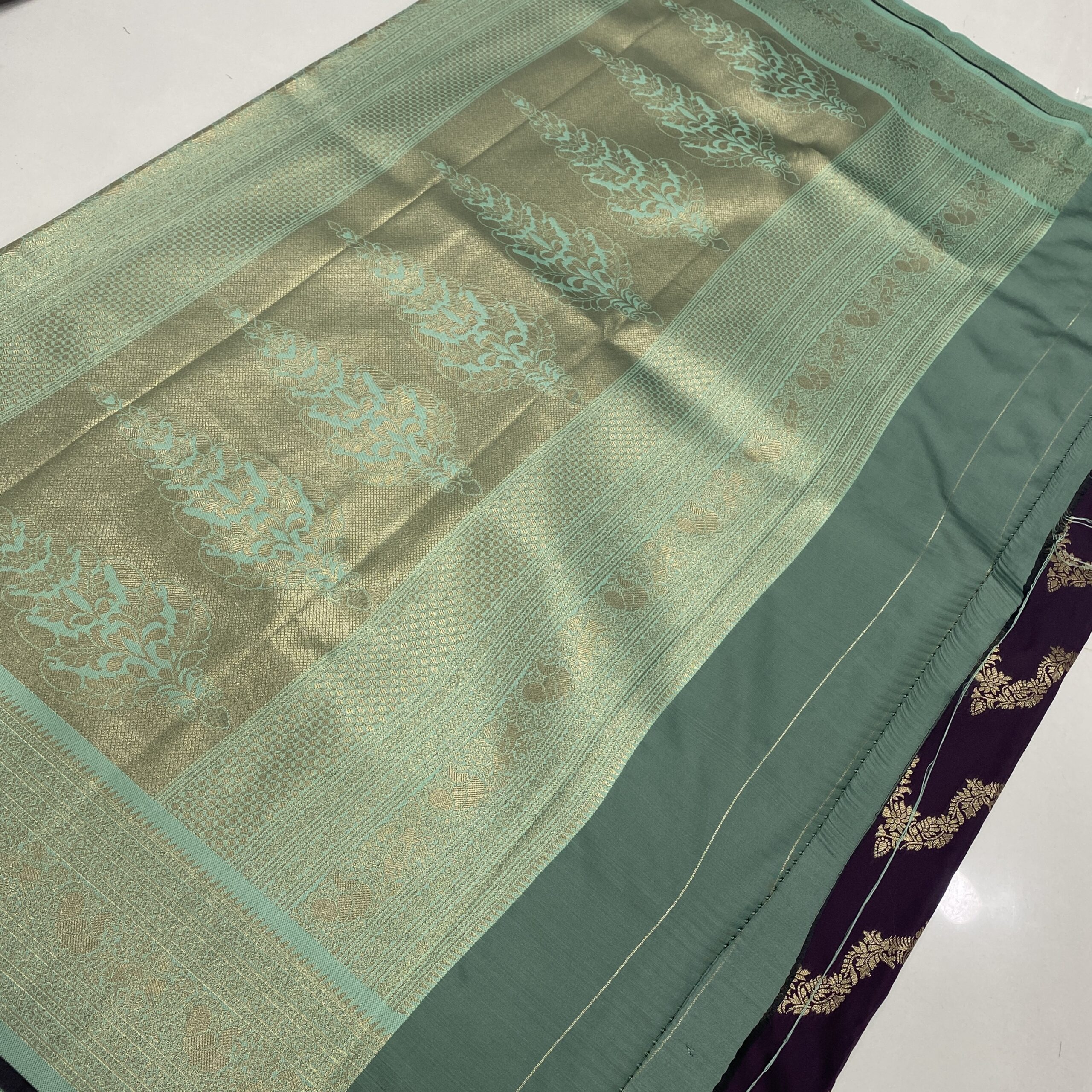 Wine semi Kanchipuram silk saree contrast pallu with zari detailing
