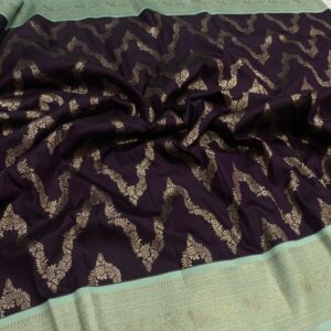 Wine semi Kanchipuram silk saree with waves zari design and pista contrast border