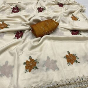 Beige tussar chiffon saree with floral embroidery and faux mirror cut work border