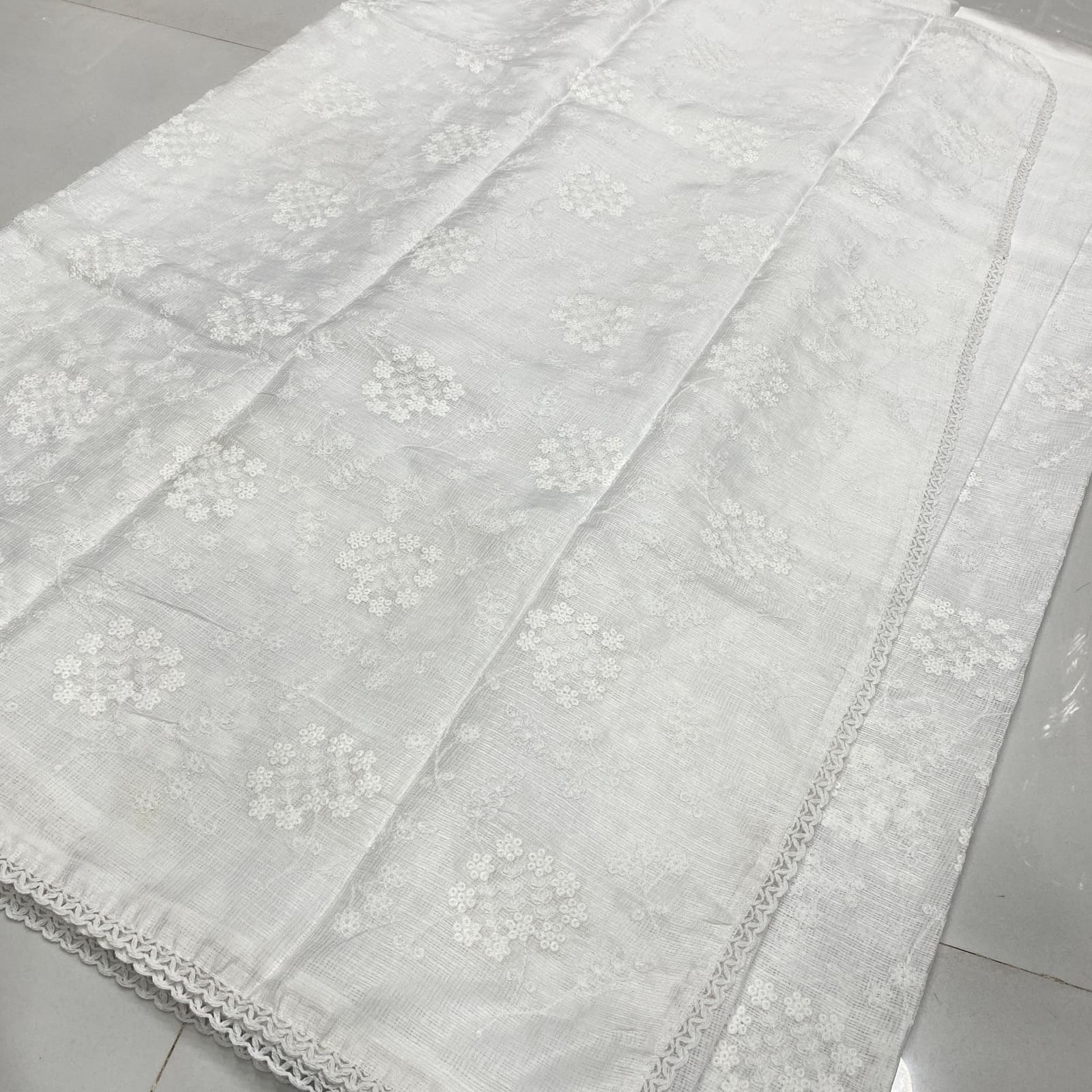 White Kota saree pallu with detailed embroidery work