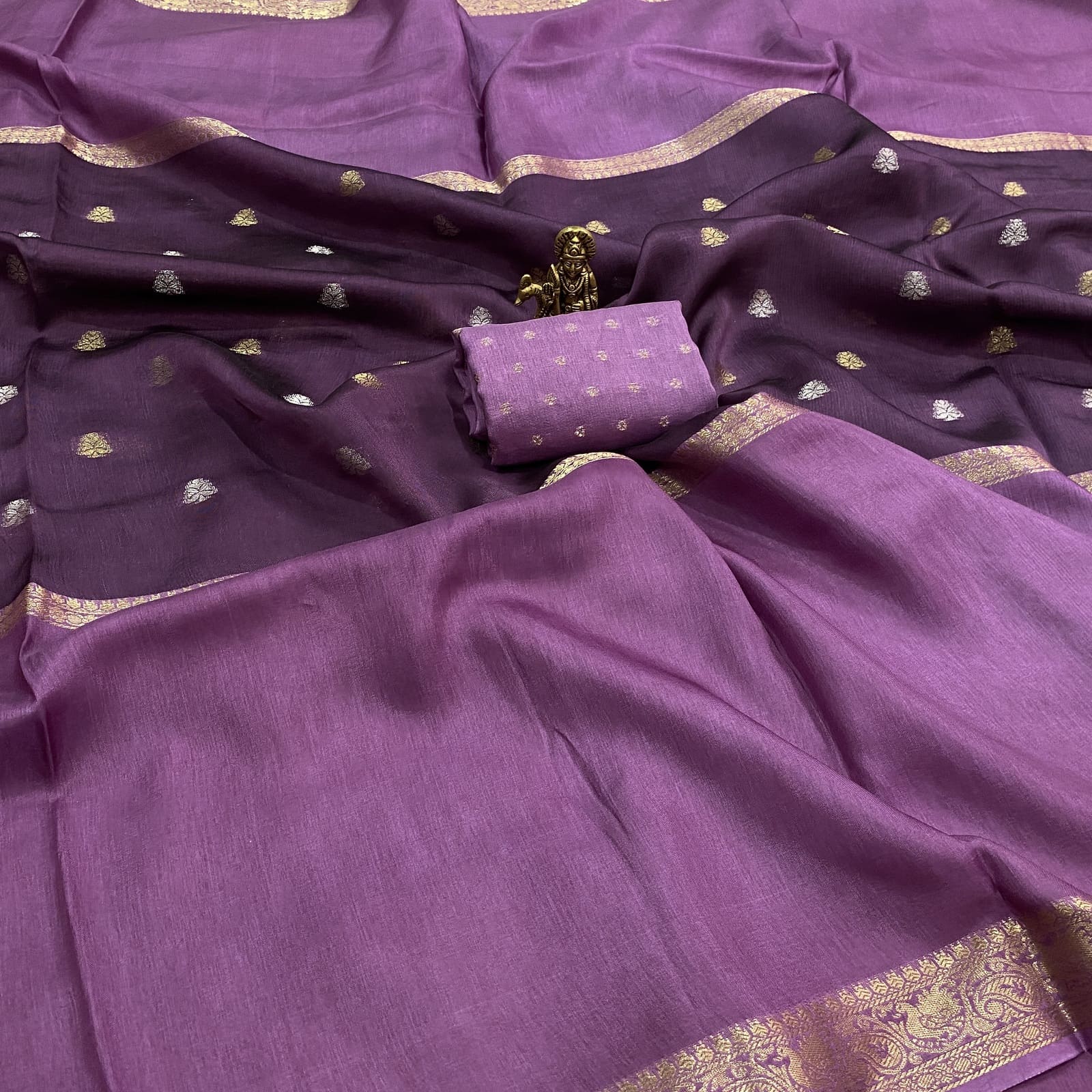 Lavender pure viscose crepe silk saree with mid weave butta design