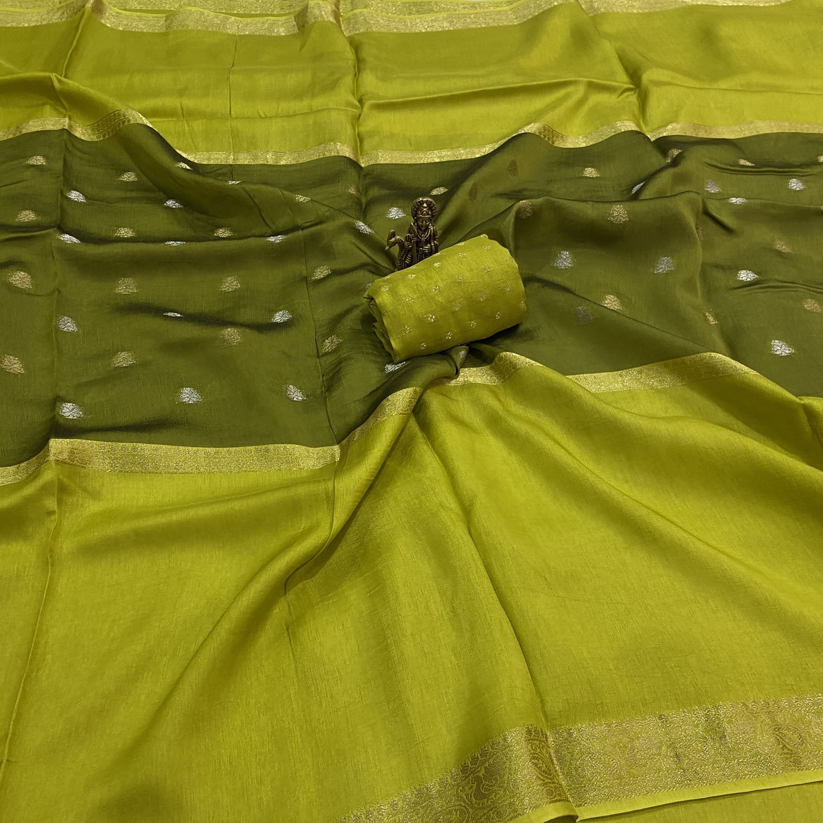 Lime pure viscose crepe silk saree with mid weave butta design