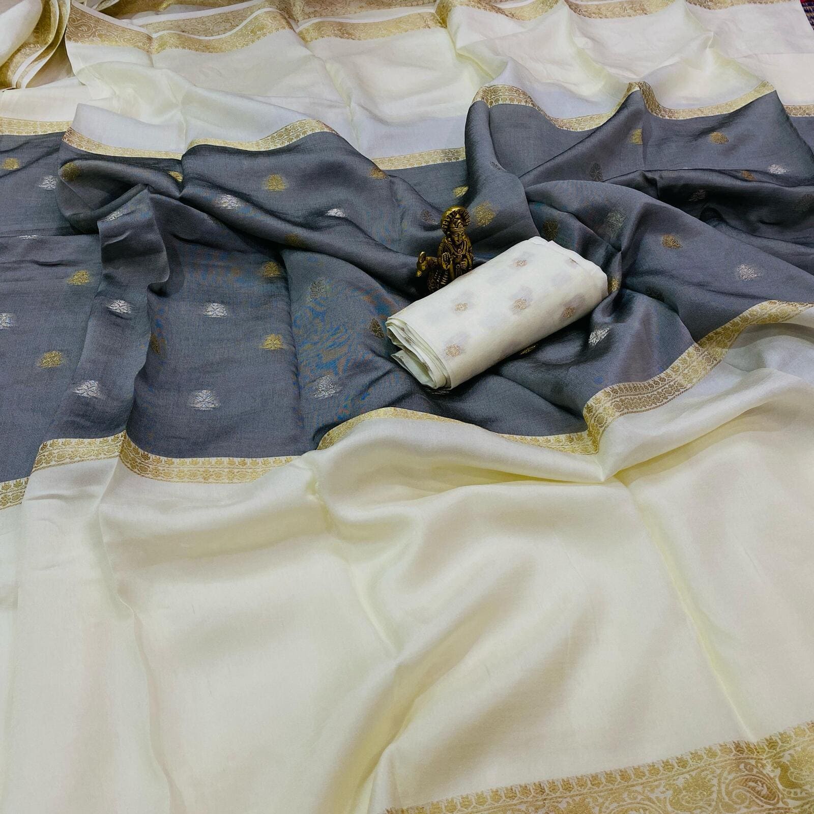 White pure viscose crepe silk saree with mid weave butta design