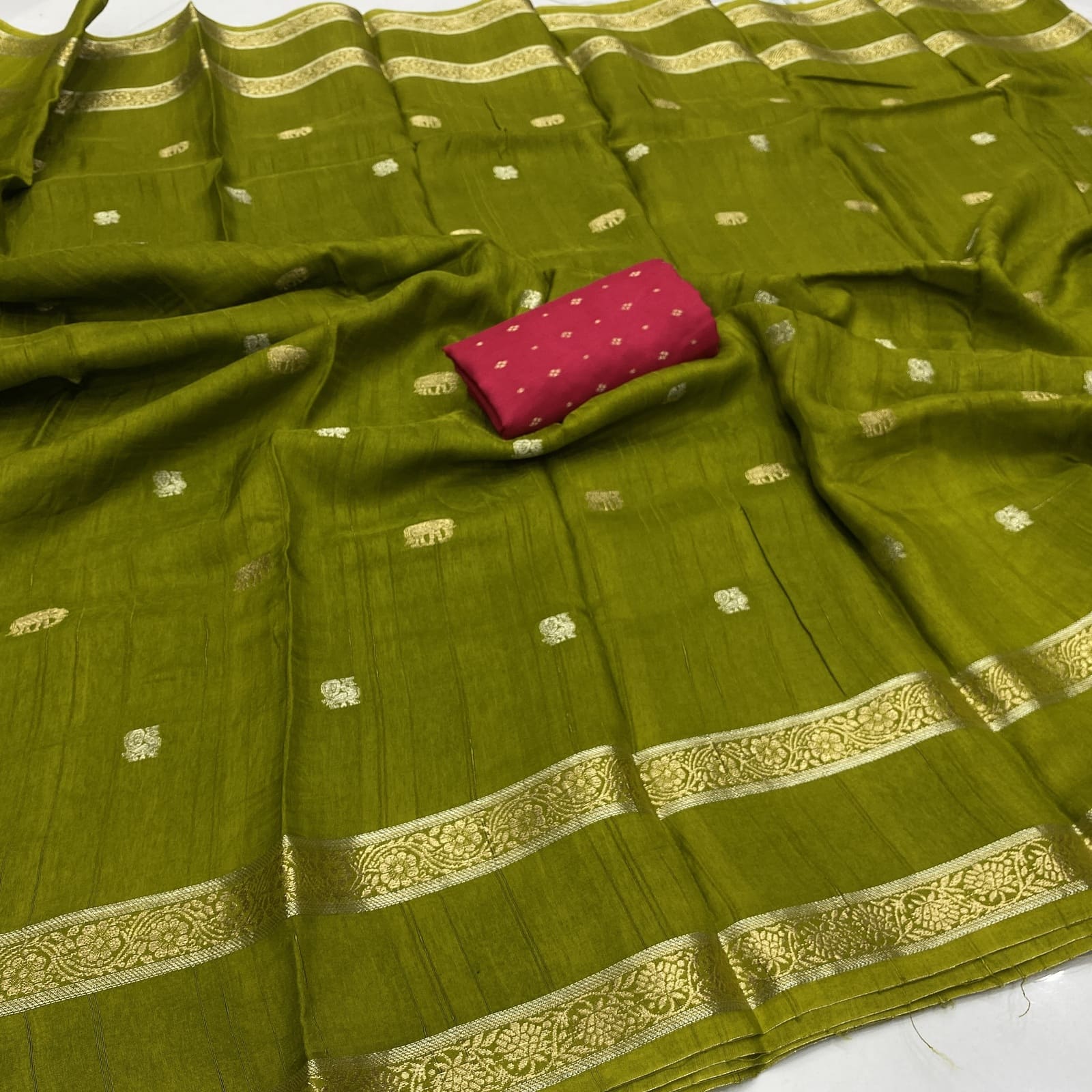 Green viscose georgette silk saree with elephant annam butta motifs
