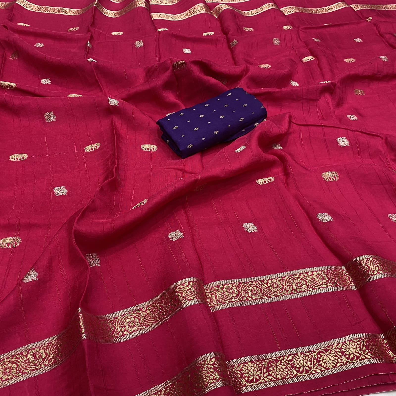 Pink viscose georgette silk saree with elephant annam butta motifs