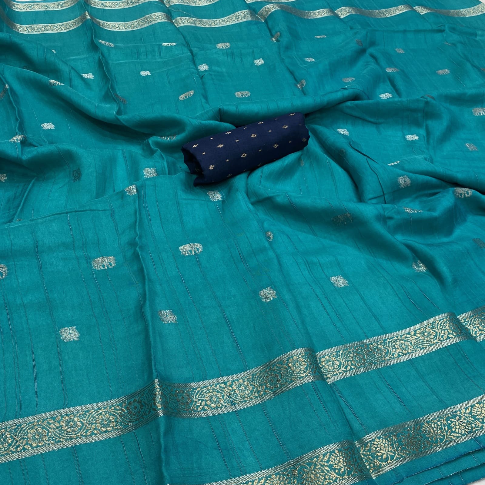 Sapphire blue viscose georgette silk saree with elephant annam butta motifs